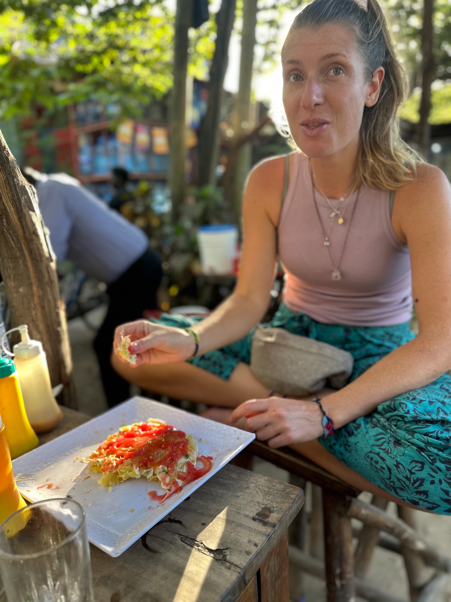 Traveler enjoying a casual meal at Coco Beach in Dar es Salaam