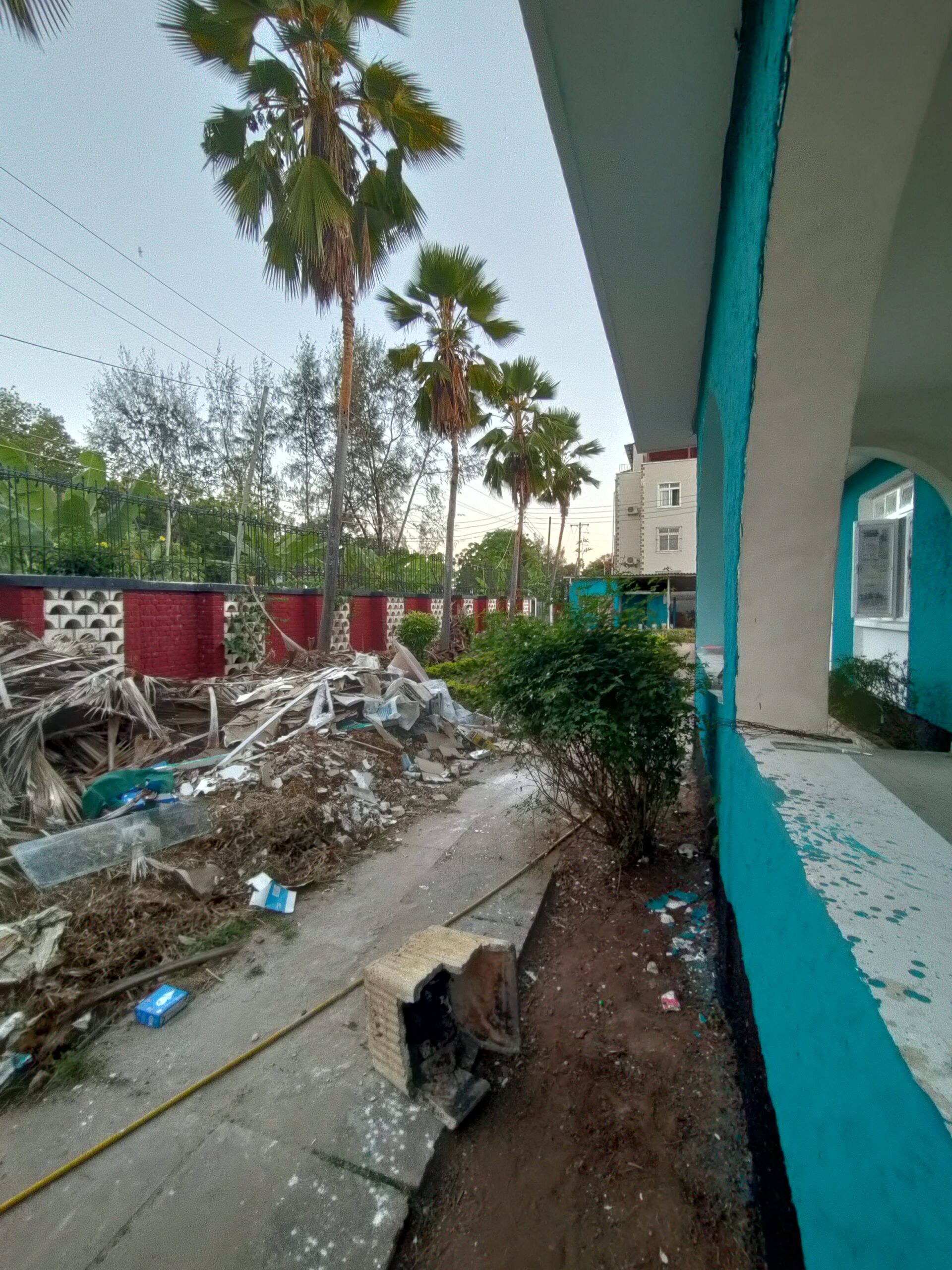 Renovation debris being cleared from the Gallivanters Hostel property