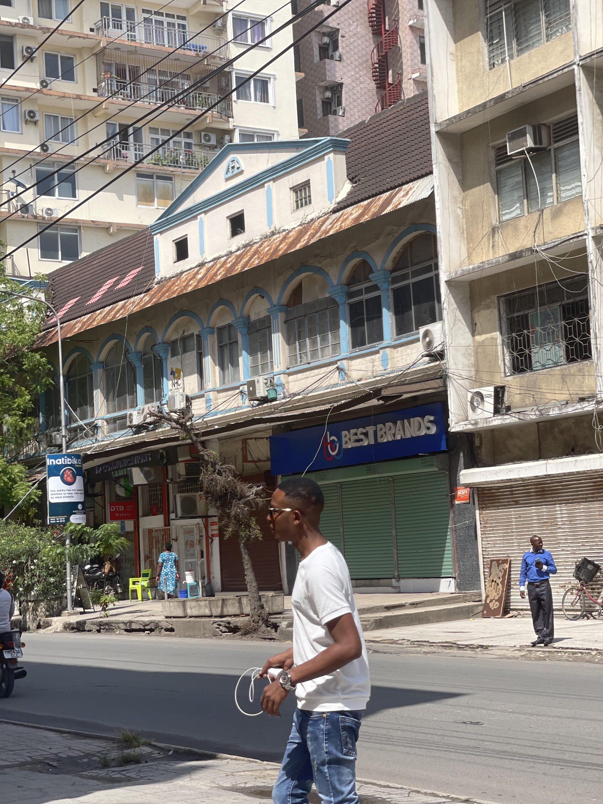 Buildings and shops along a city street in Dar es Salaam
