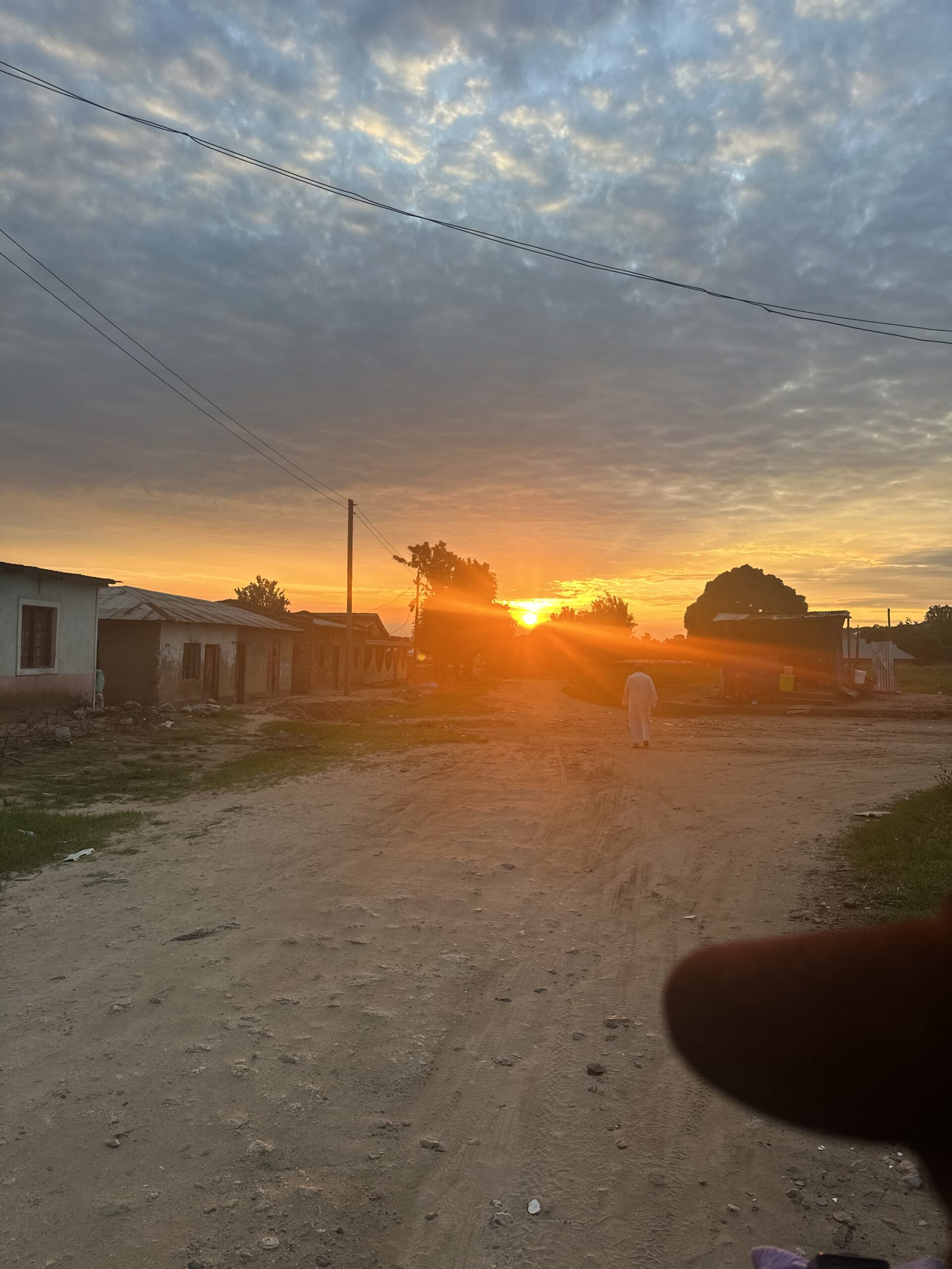 Sunset over a road in rural Tanzania